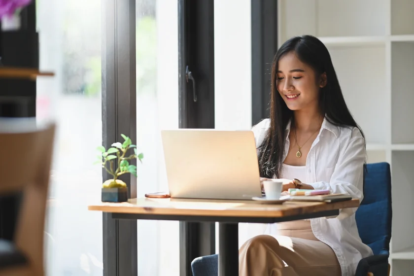 Blog publishing and content formatting on laptop in a modern workspace